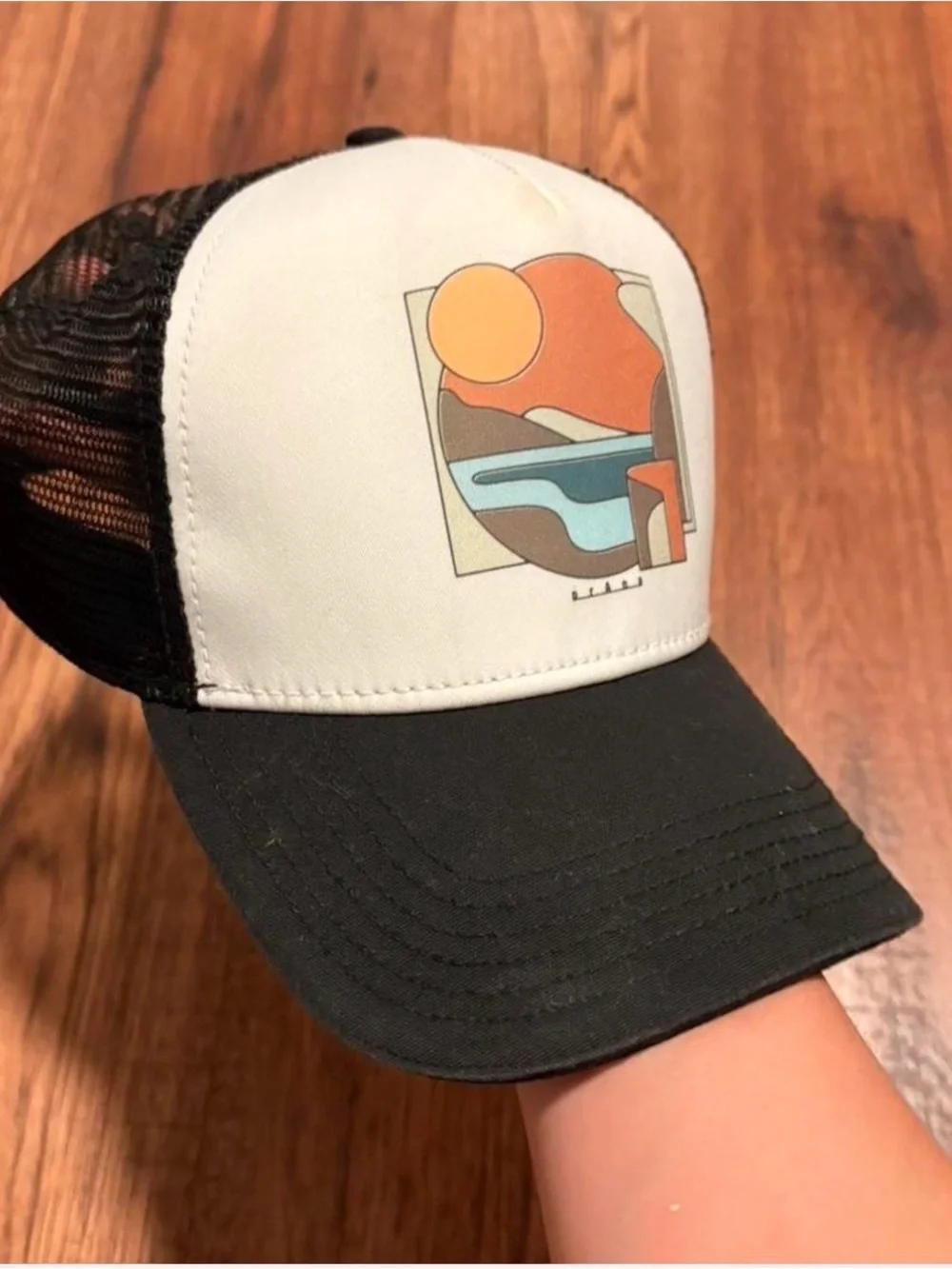 Source Unknown Black and White Trucker Hat with Orange Graphic